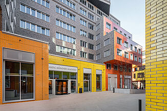 Part of the building with entrance to the Scandic Hotel in the mixed-use property die Macherei in Munich.