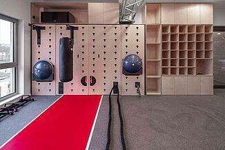 Training wall in the fitness studio of SSV Jahn Regensburg with a REGUPOL sports floor covering.