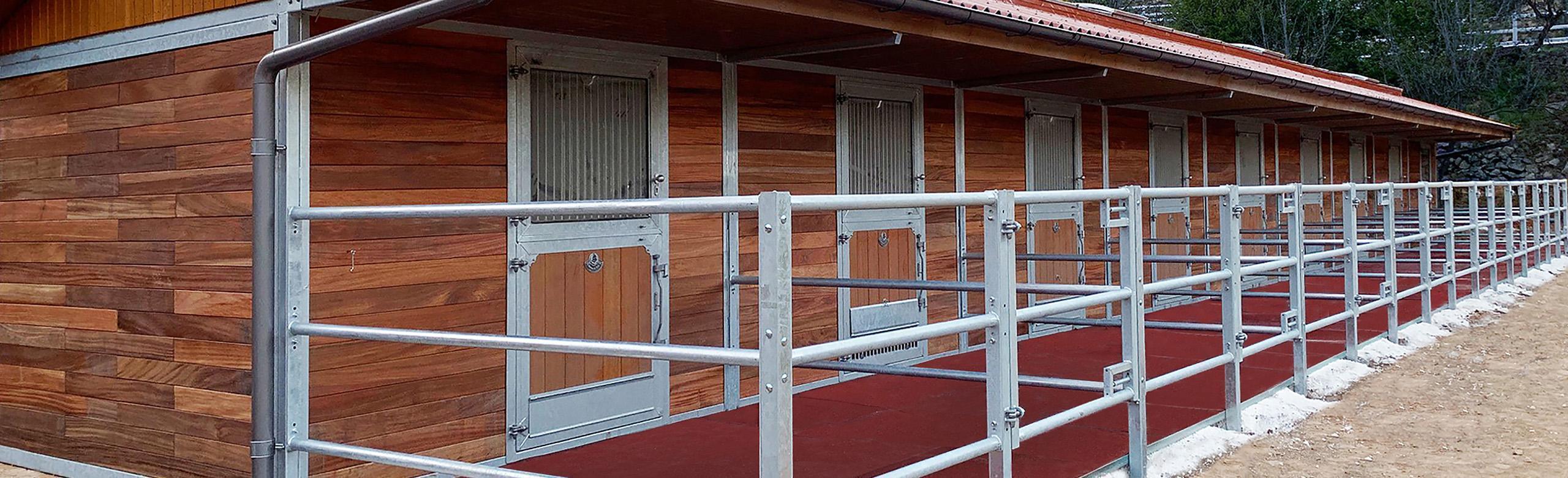 Free-runnning paddock with REGUPOL equiline multi - elastic, non-slip and easy-care rubber flooring for keeping horses